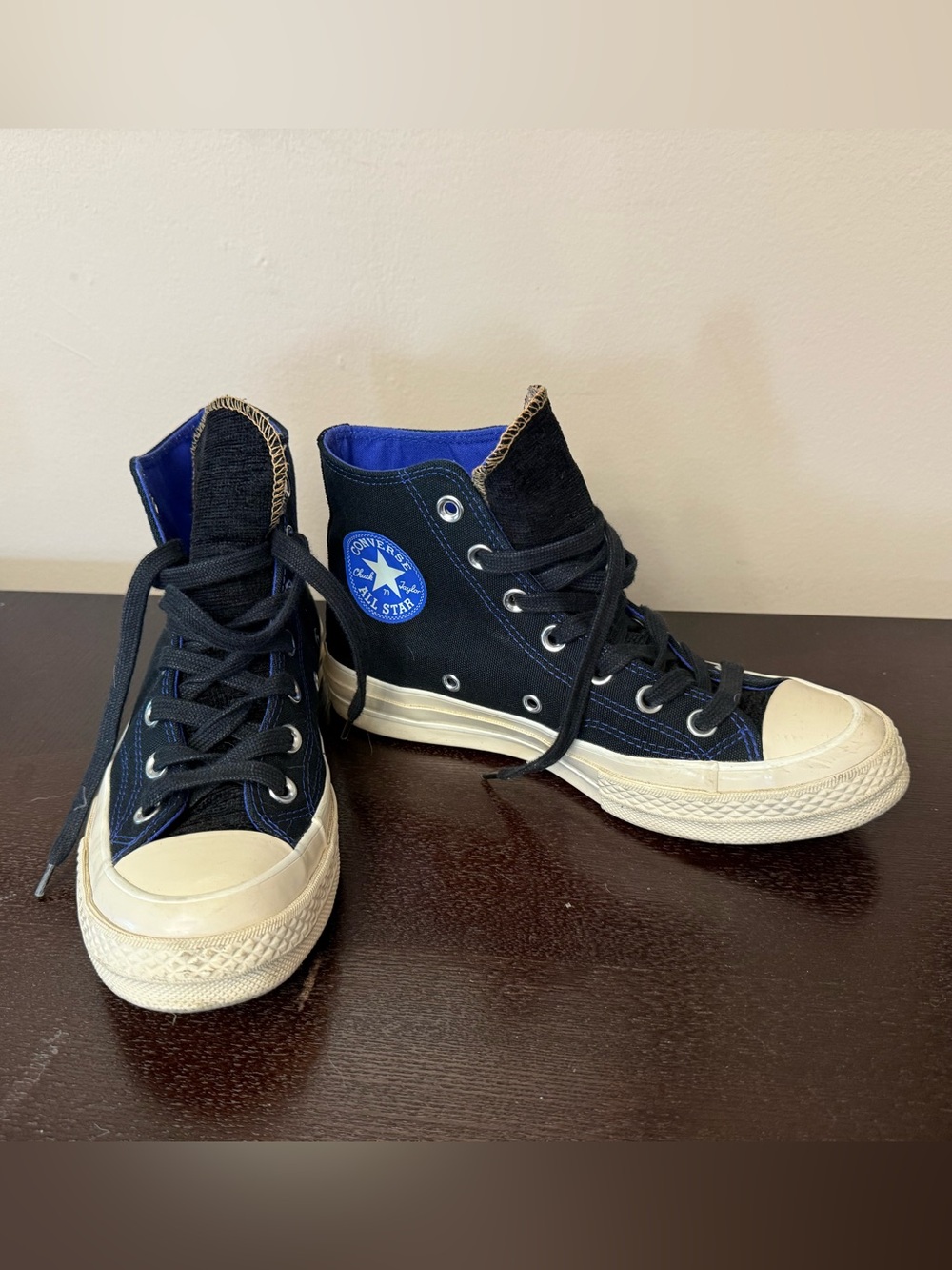 Converse Black High Top Sneakers with Blue Logo